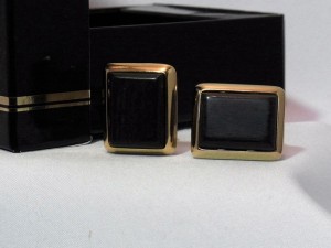 Yves Saint Laurent goldtone clip earrings from the Safari line e.JPG